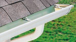 shingle roof with new gutters