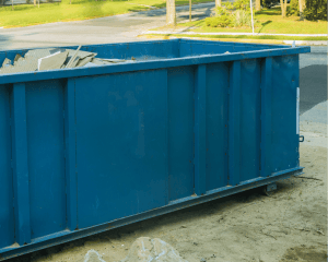Dumpster rental and removal by Wonder Roofing and Renovations